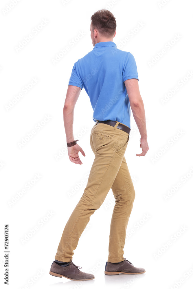 casual young man turns his back casual young man turns his back