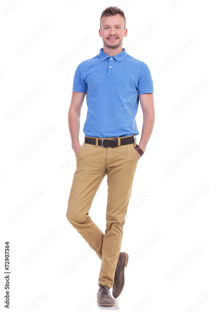 casual young man with both hands in pockets casual young man with both hands in pockets
