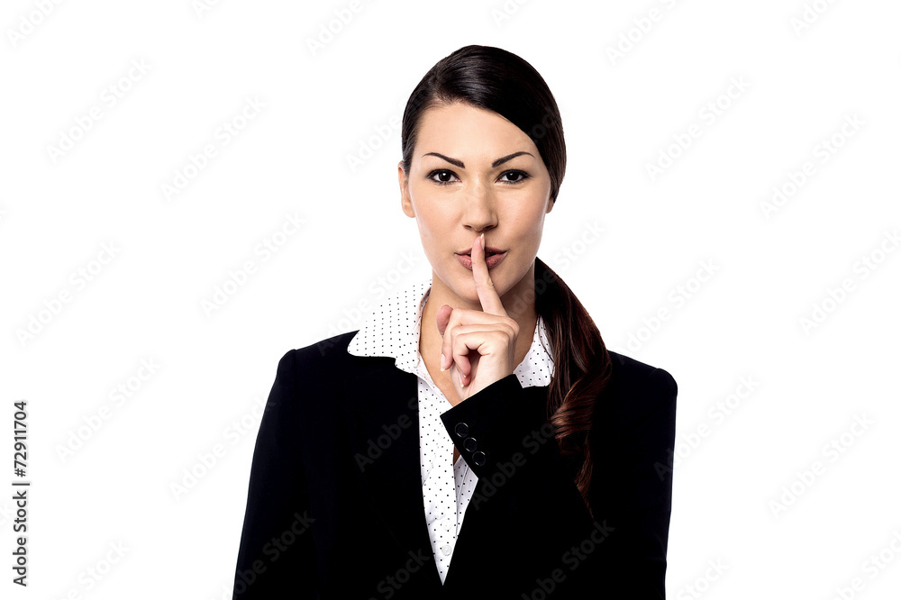 Pretty woman with finger on lips Pretty woman with finger on lips
