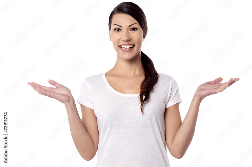 Young woman showing open hand palms Young woman showing open hand palms