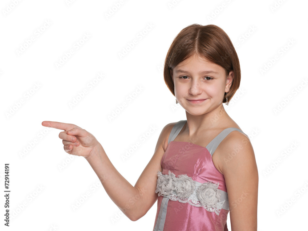 Young girl shows her fingers to the side Young girl shows her fingers to the side