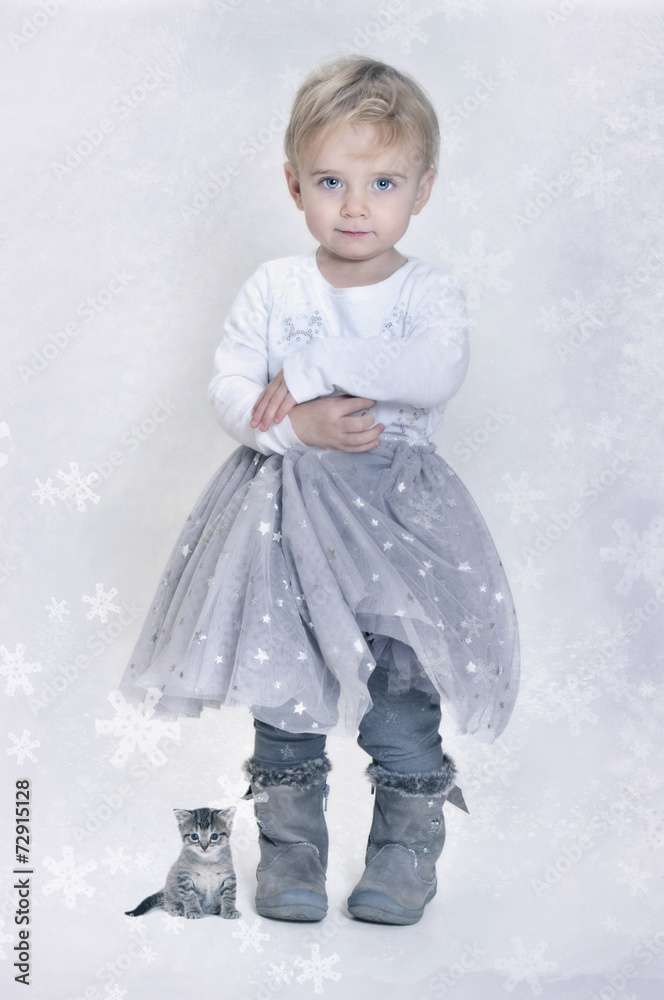 baby girl with kitten