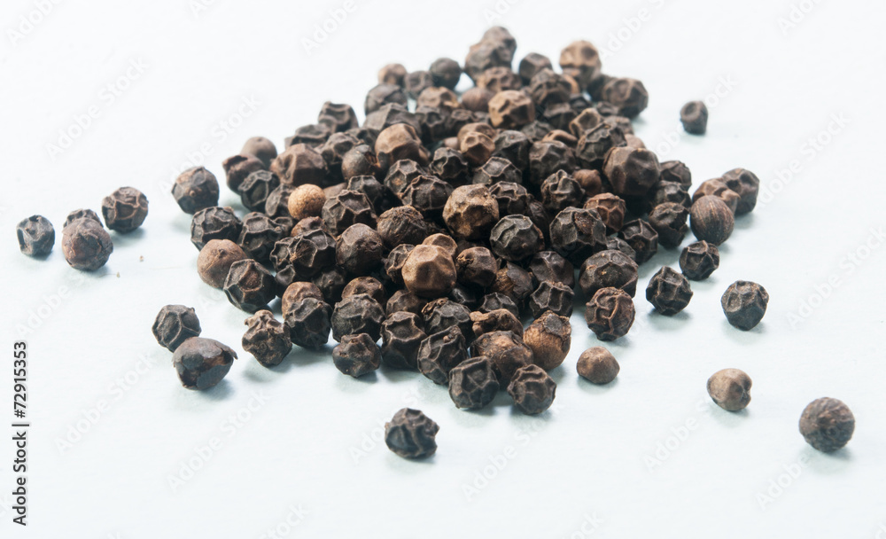 pile of Black Peppercorns close up pile of Black Peppercorns close up