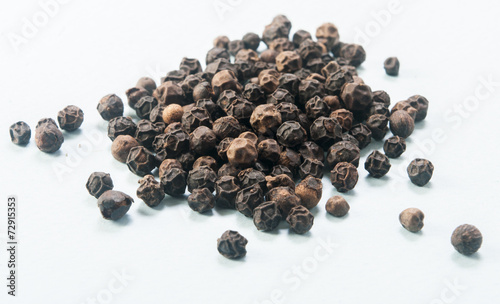 pile of Black Peppercorns close up