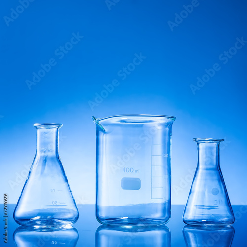 Laboratory equipment on blue background