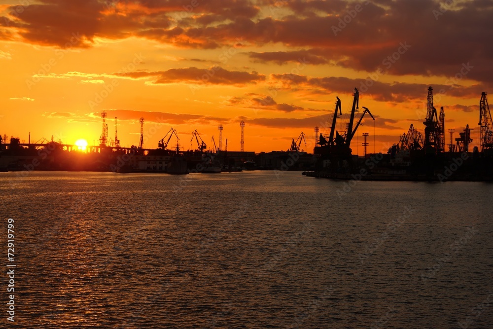Bright Colorful Sunset at Cargo Sea Port