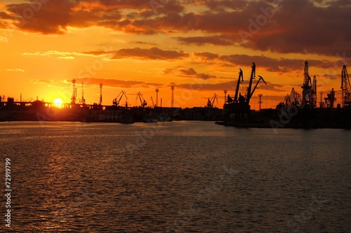 Bright Colorful Sunset at Cargo Sea Port