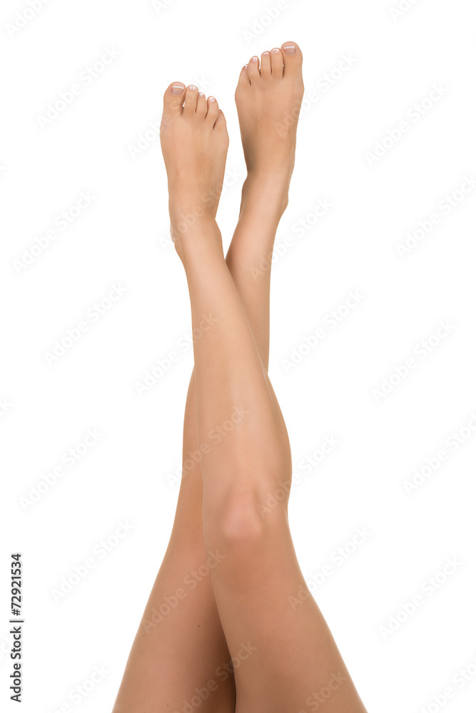 Attractive pose, legs crossed on white background. Attractive pose, legs crossed on white background.