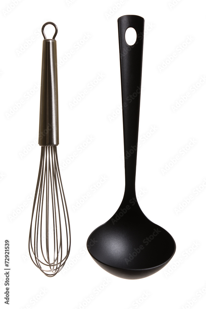 Modern black ladle and metallic whisk on white background. Modern black ladle and metallic whisk on white background.