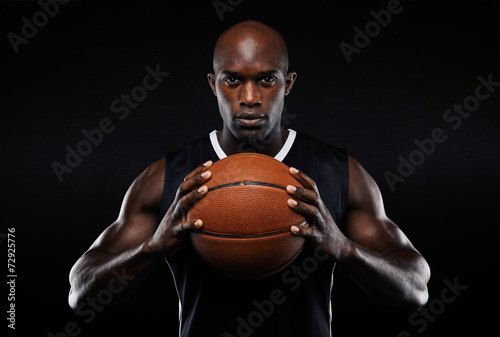Afro american male basketball player with a ball © Jacob Lund