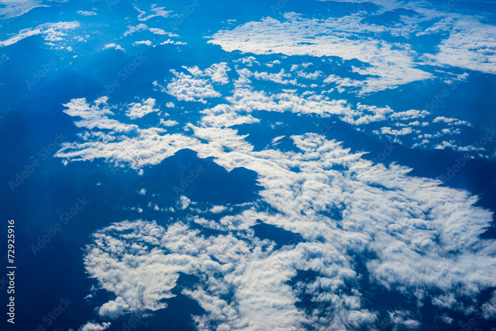 Fototapeta premium The View from the plane above the cloud and sky