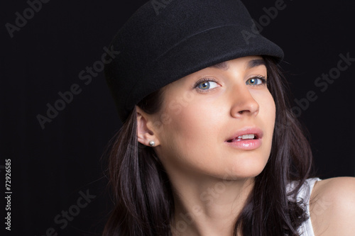 the attractive woman in a cap © Dmytro Shevchenko