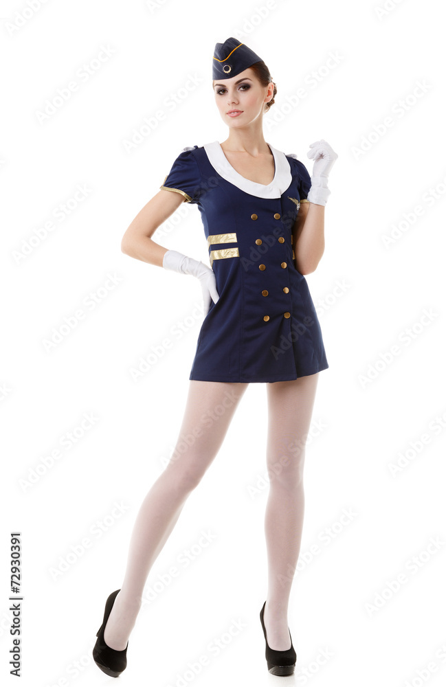 Fototapeta premium Charming Stewardess Dressed In Blue Uniform On White Background.