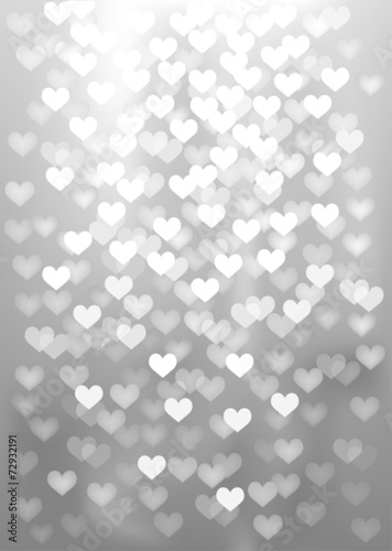 Silver festive lights in heart shape, vector background.