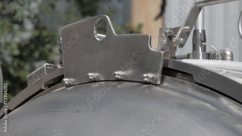 Opening  lid of the autoclave