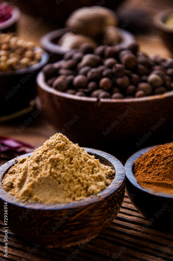 Colorful theme with spices on wooden table
