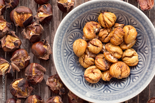 Peeled roasted sweet chestnuts in a bowl.
