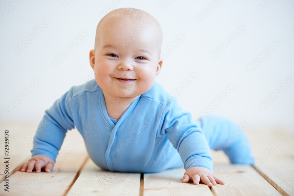 Happy baby with a beaming smile Happy baby with a beaming smile