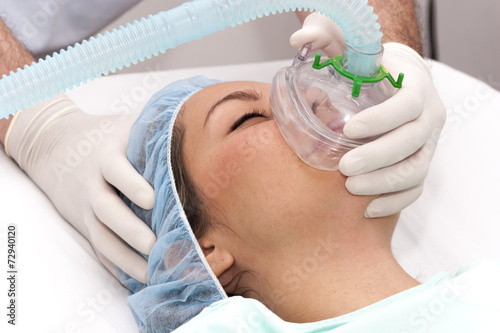 Beautiful patient receives anaesthetic