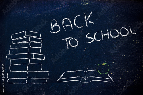 back to school: pile of books, open book and apple