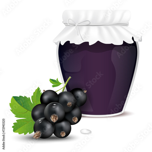 Blackcurrant jam in a jar and fresh blackcurrant