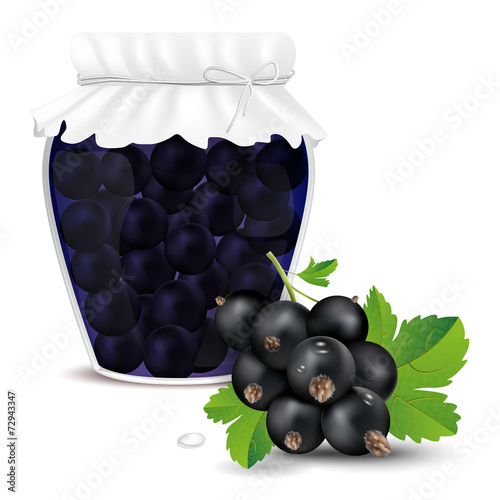 Blackcurrant compote in a jar and fresh blackcurrant