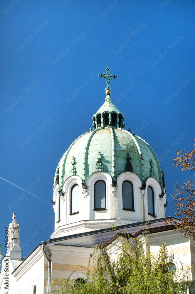Orthodox church dome on blue sky background