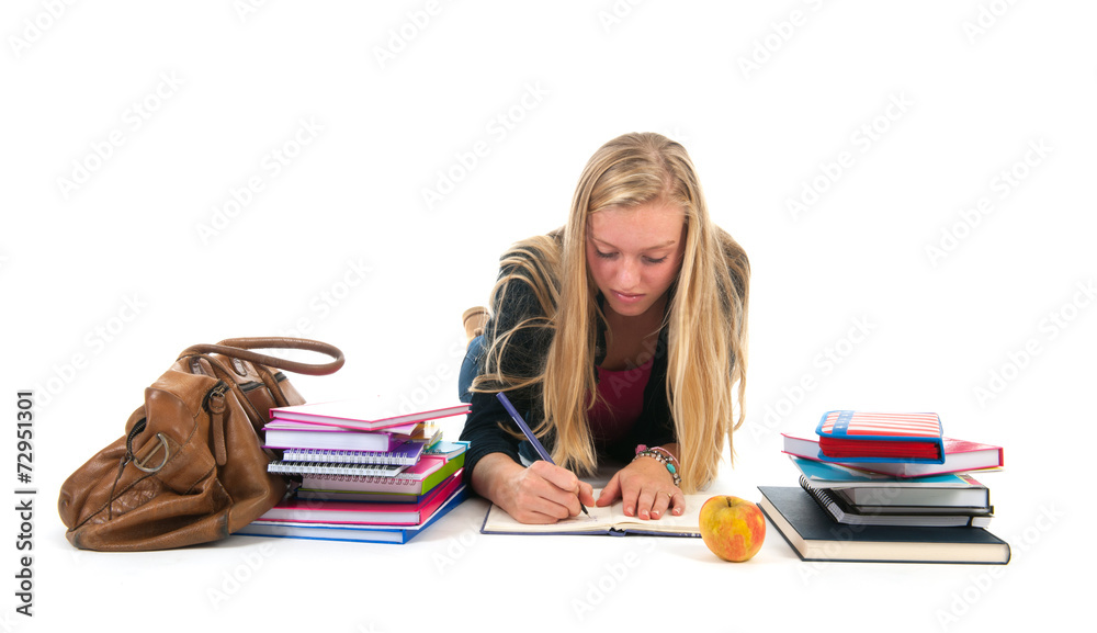 Teen girl making homework for school Teen girl making homework for school