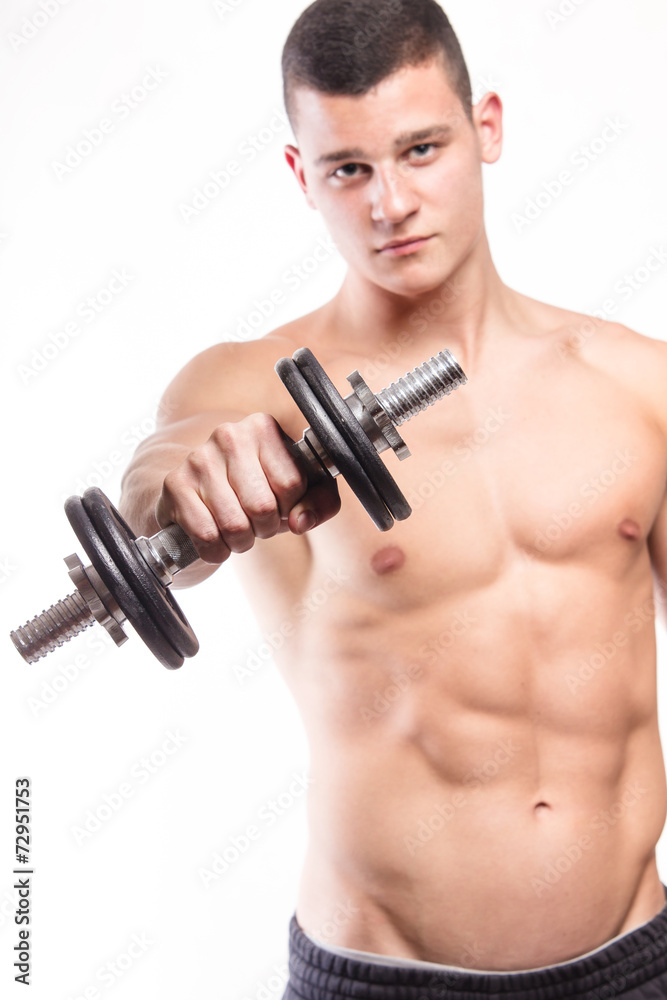 Muscular fitness man holding dumbbell