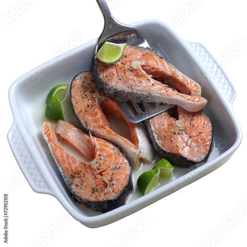 Salmon baked with white wine on a white background