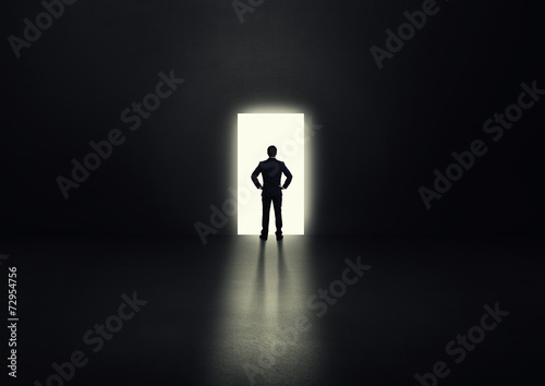 man before the open door