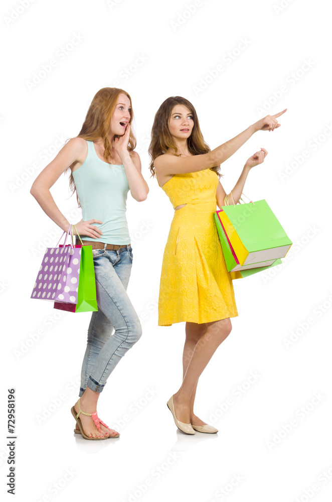 Friends with shopping bags isolated on white