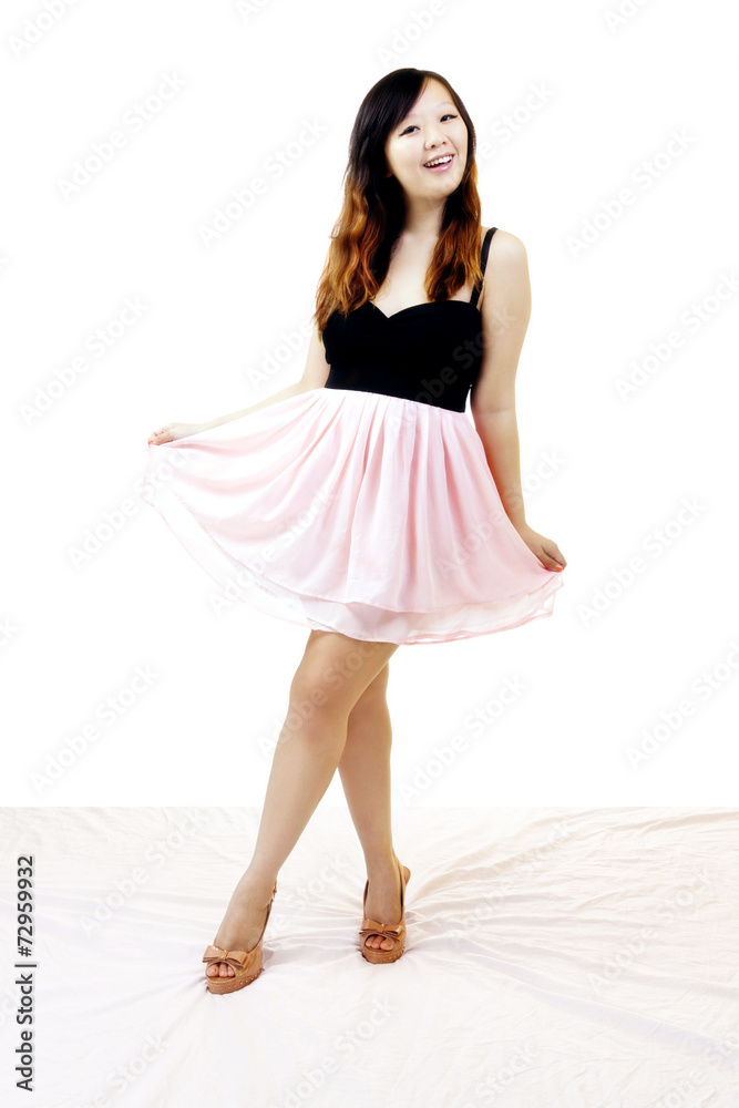 Naklejka premium Young Asian American Woman Standing Dress Shoes