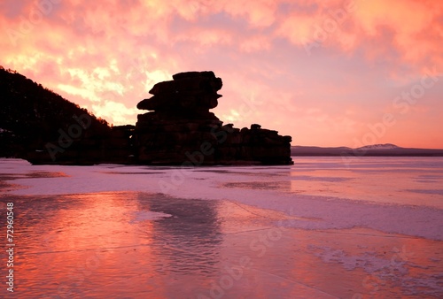 Magic sunrise on winter lake Borovoe. Kazakhstan.