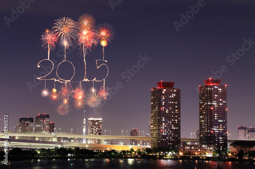 2015 New Year Fireworks celebrating over Tokyo cityscape