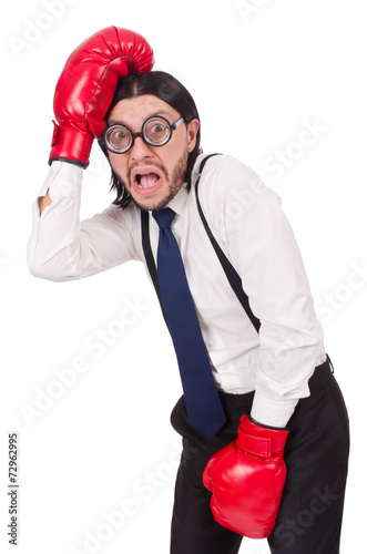 Funny young businessman with boxing gloves isolated on white