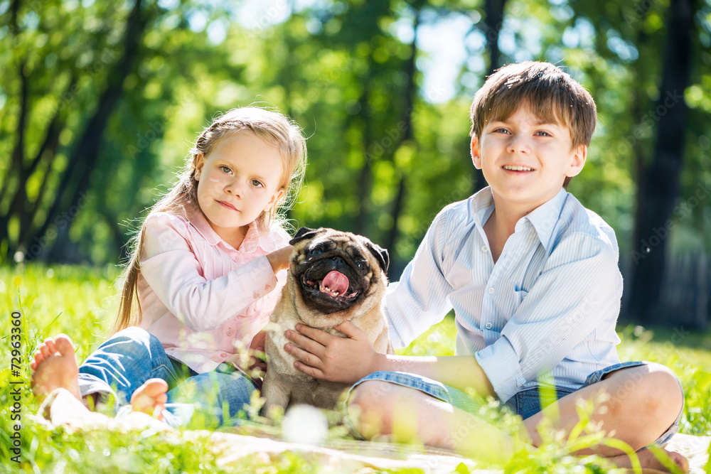 Children in park with pet Children in park with pet