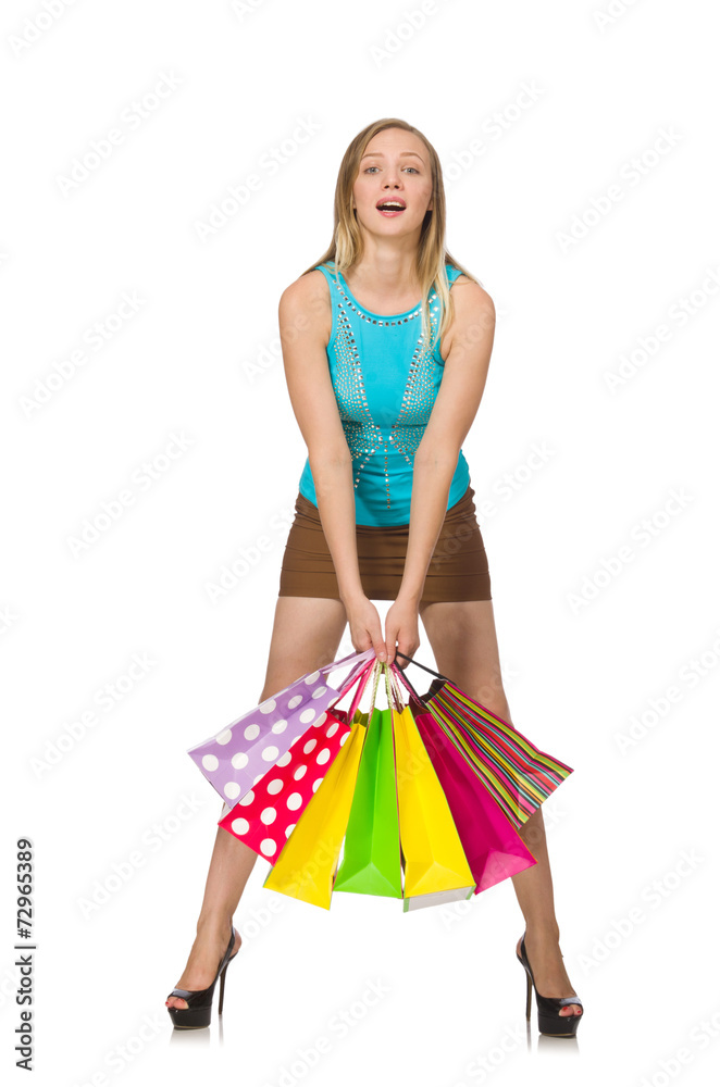 Woman with shopping bags isolated on white