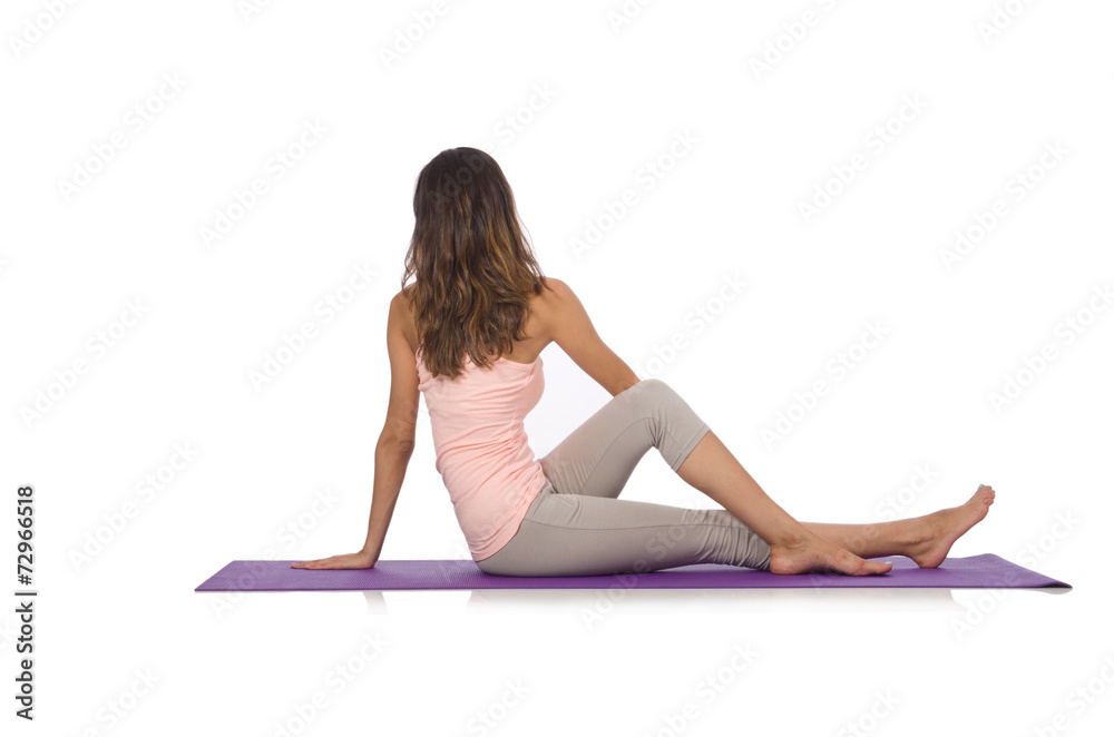 Young woman doing sport exercises isolated on white Young woman doing sport exercises isolated on white