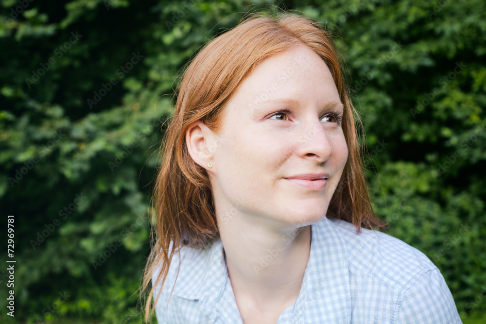 Face of a Happy Woman in a Park