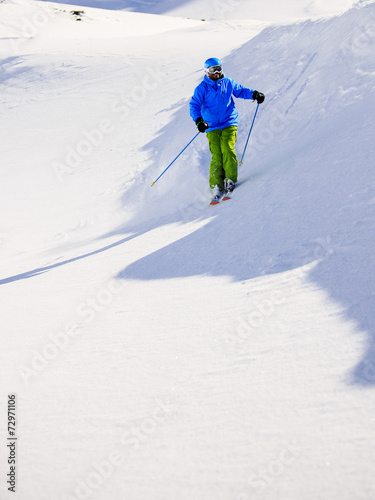 Skiing, Skier, Freeski, Freeride in fresh powder snow
