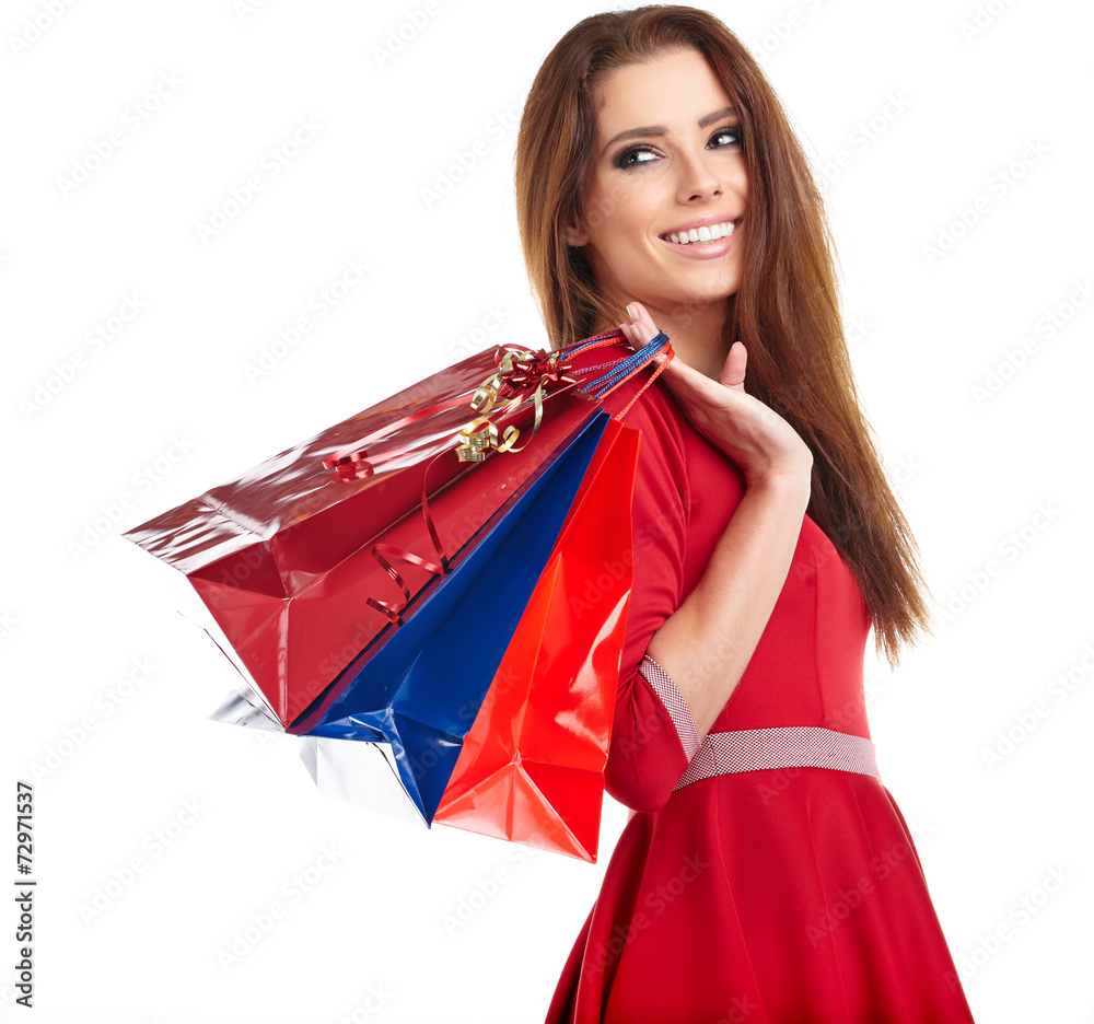 young happy smiling woman with shopping bags, isolated over whit young happy smiling woman with shopping bags, isolated over whit