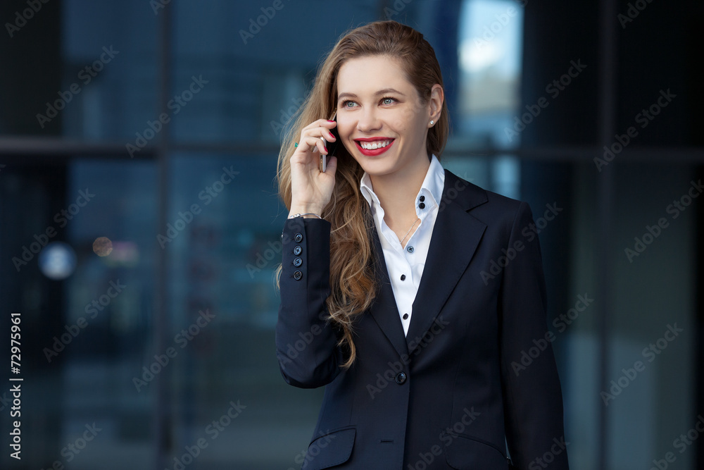 business woman speaks by phone business woman speaks by phone