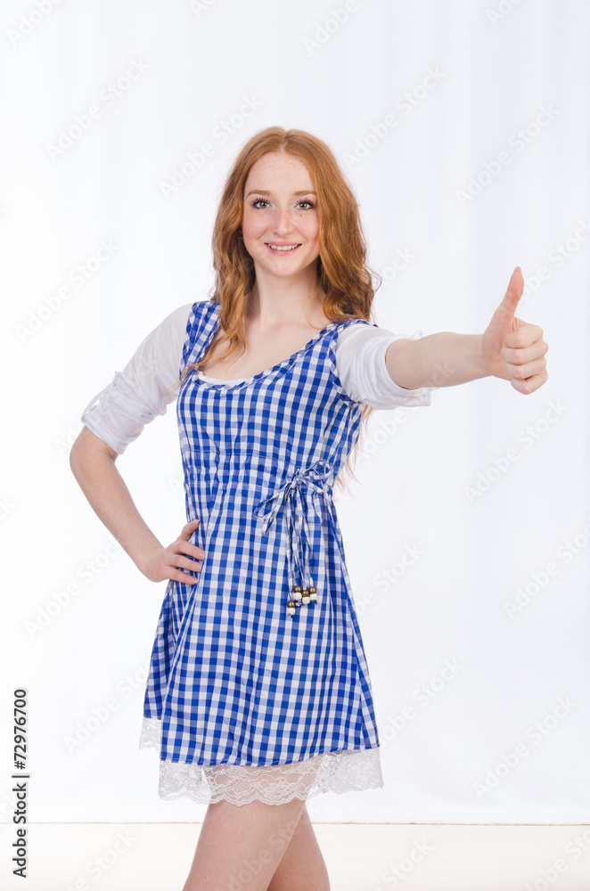 Woman giving thumbs up isolated on white