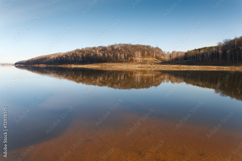 beach of the river in cold autumn day