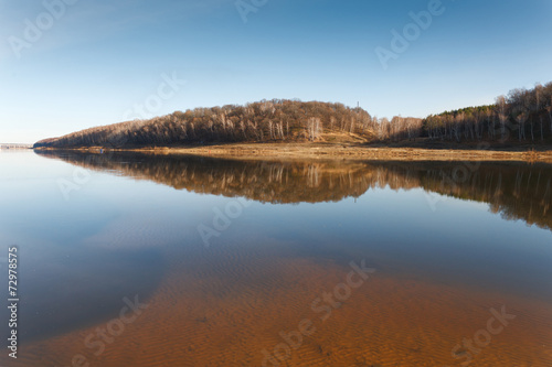 beach of the river in cold autumn day