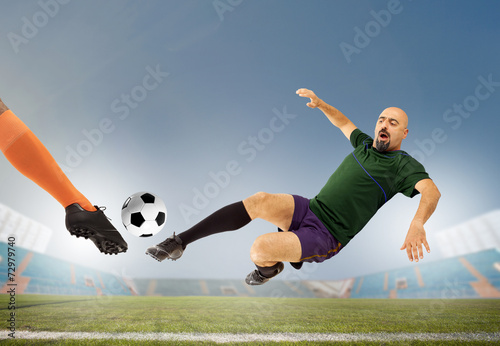 Soccers striking the ball © sebra