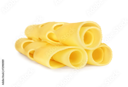 three rolled slices of Swiss cheese, served for breakfast or as
