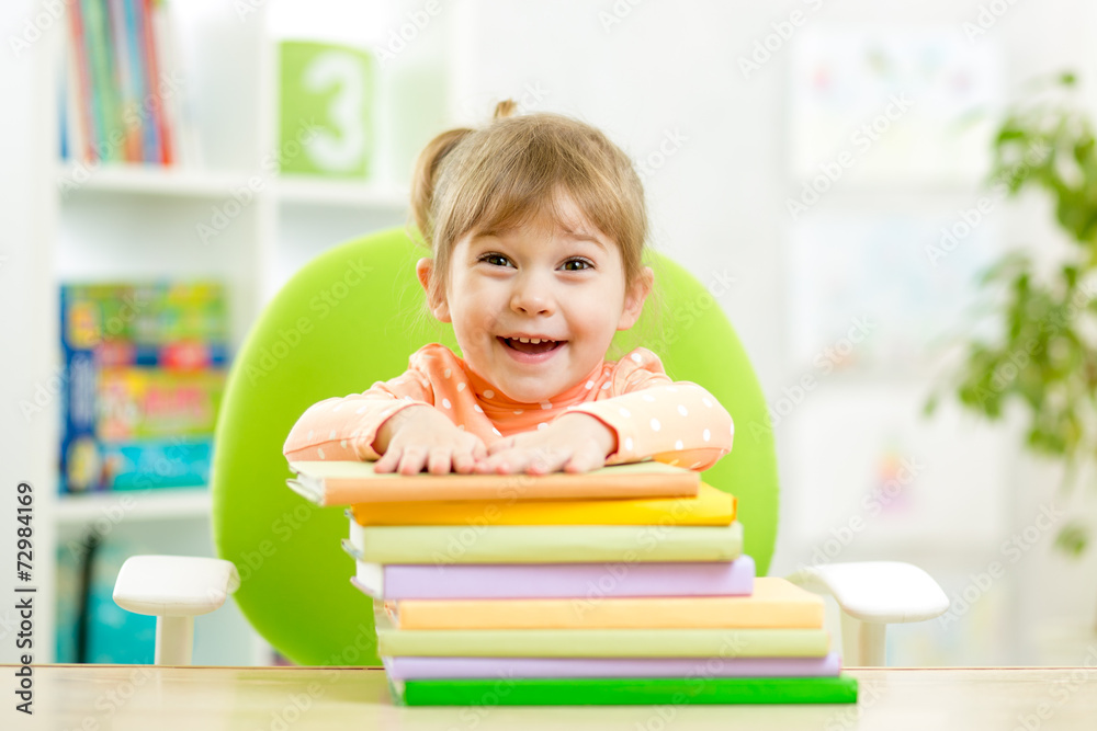 Cute kid girl preschooler with books Cute kid girl preschooler with books