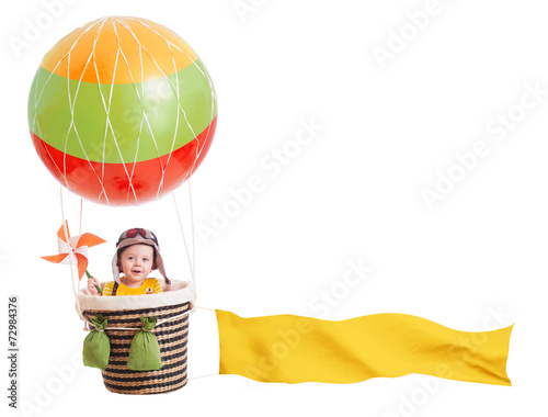 cheerful child girl on hot ...